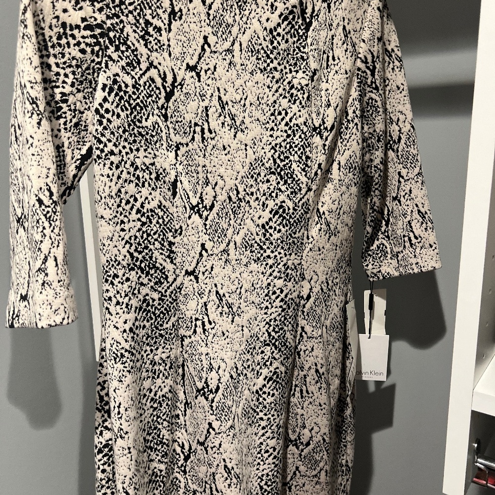 New with tags Never worn: Calvin Klein Cheetah Print Dress size 6